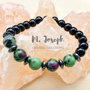 How can you mend a broken heart? With this zoisite, jasper, and hematite bracelet! While you're at it, protect yourself in high-risk jobs and against curses... YES, curses!