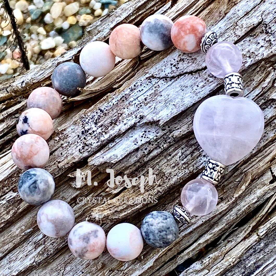 The vibrations of love and positivity are prevalent in this bracelet with the combination of rose quartz and jasper.