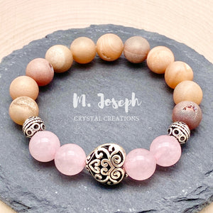 Channel the Goddess of Love with this bracelet and its special combination of rose quartz and druzy agate.